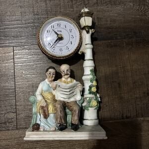 Vintage Clock Old Couple Sitting On Bench Works VTG